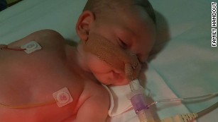 U.S. doctor examines baby Charlie Gard