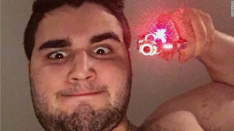 Alleged killer Cosmo Dinardo holds a firearm in an undated photo posted on social media.