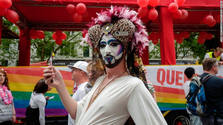 A Sister of Perpetual Indulgence strikes a pose during the annual gay pride parade in Berlin.