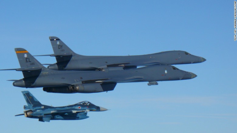 Two U.S. Air Force B-1B Lancers join a Japan Air Self-Defense Force F-2 fighter jet in a show of force after North Korea&#39;s latest missile test.