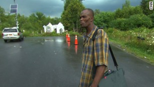 Jean-Enice Frederic prepares to illegally cross the U.S.-Canada border.