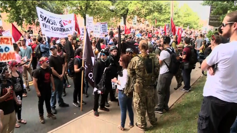 Counter-protesters gather in Charlottesville, Virginia, on Saturday morning ahead of a &quot;Unite the Right&quot; rally.