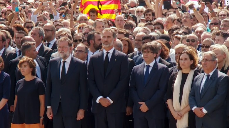 King Felipe VI of Spain leads a moment of silence  in Plaça de Catalunya on Friday.