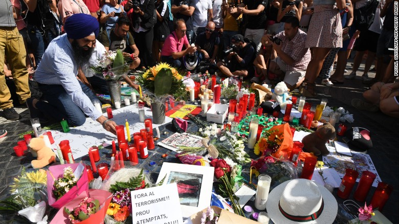 A makeshift memorial pays tribute to those who were killed in a terror attack in Barcelona, Spain, on Thursday, August 17. A van rammed into a crowd of people near the popular tourist area of Las Ramblas. Early the next morning, a group of five attackers drove into pedestrians in the Spanish town of Cambrils, about 75 miles south of Barcelona.