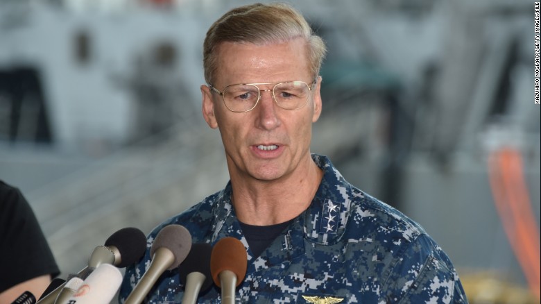 Vice Adm. Joseph Aucoin, Commander of the US 7th Fleet, delivers a speech in front of the USS Fitzgerald at US Navy Yokosuka Base, southwest of Tokyo on June 18, 2017.