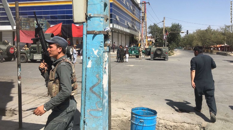 Afghan security officials are on the scene Friday near the Imam Zaman Mosque in Kabul.