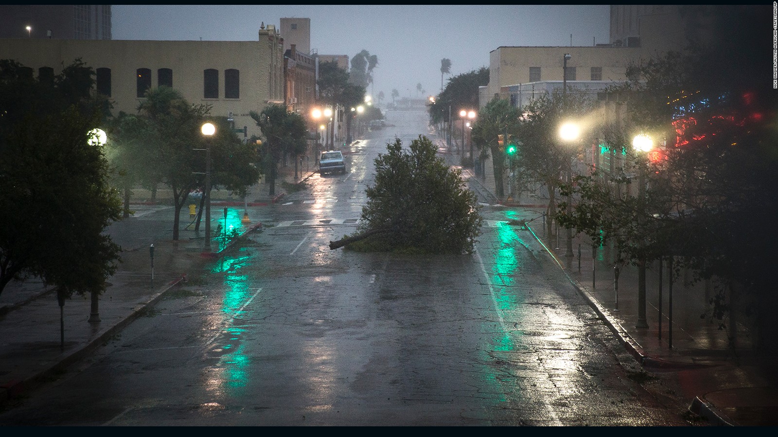 A tree blocks a street as Hurricane Harvey makes landfall in Corpus Christi, Texas on Friday.