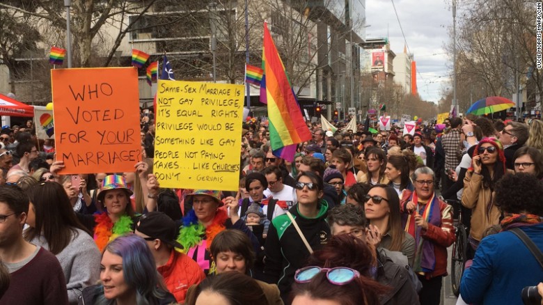 Advocates for same-sex marriage march in Melbourne, Saturday, August 26.