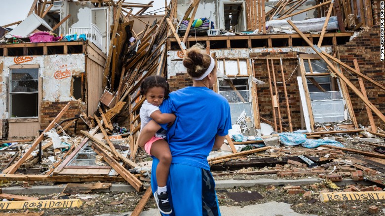 Residents of Rockport, Texas, return to their destroyed home on August 27. 