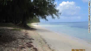 Hall arrested Li near this beach in Saipan where his father fought during World War II.