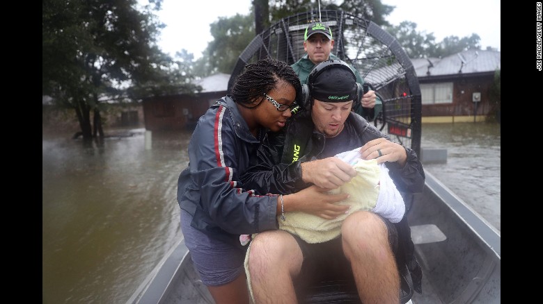 Shardea Harrison looks at her 3-week-old baby, Sarai, as Dean Mize, right, and Jason Legnon use an airboat to rescue them from their home in Houston on Monday, August 28, three days after Hurricane Harvey made landfall in Texas. The Category 4 storm came ashore shortly after 11 p.m. Friday, just north of Port Aransas. &lt;em&gt;Correction: Previous versions of this gallery incorrectly reported that Hurricane Harvey is the strongest storm to make landfall in the United States since Wilma in 2005. Harvey is actually the strongest storm to make landfall in the United States since Charley in 2004.&lt;/em&gt;