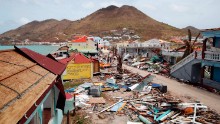 This general view shows buildings destroyed by Hurricane Irma on the French Caribbean island of Saint Martin on September 12, 2017, during the visit of France&#39;s President Emmanuel Macron . 
French President Emmanuel Macron and British Foreign Secretary Boris Johnson travelled Tuesday to the hurricane-hit Caribbean, rebuffing criticism over the relief efforts as European countries boost aid to their devastated island territories. / AFP PHOTO / POOL / Christophe Ena        (Photo credit should read CHRISTOPHE ENA/AFP/Getty Images)