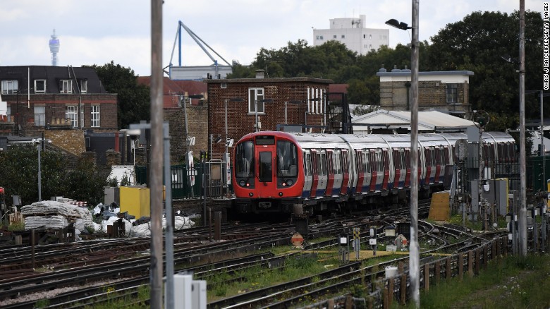  A Tube train is seen stopped at Parsons Green station on Friday.