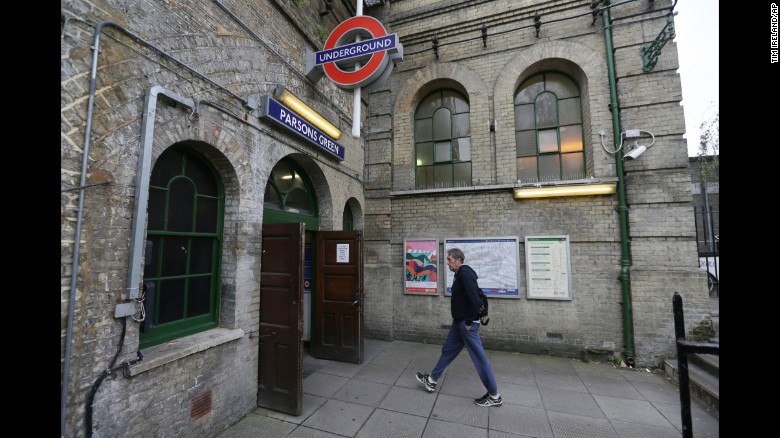 A man walks into Parsons Green subway station after it was reopened following Friday&#39;s terror attack. 