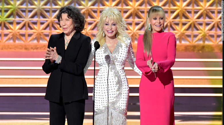 Lily Tomlin, Dolly Parton, and Jane Fonda speak onstage during the 69th Annual Primetime Emmy Awards.