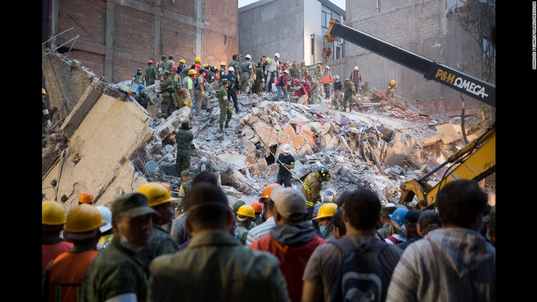 People look for survivors in Mexico City on September 20. The earthquake happened on the anniversary of a 1985 quake that killed an estimated 9,500 people in and around Mexico City.