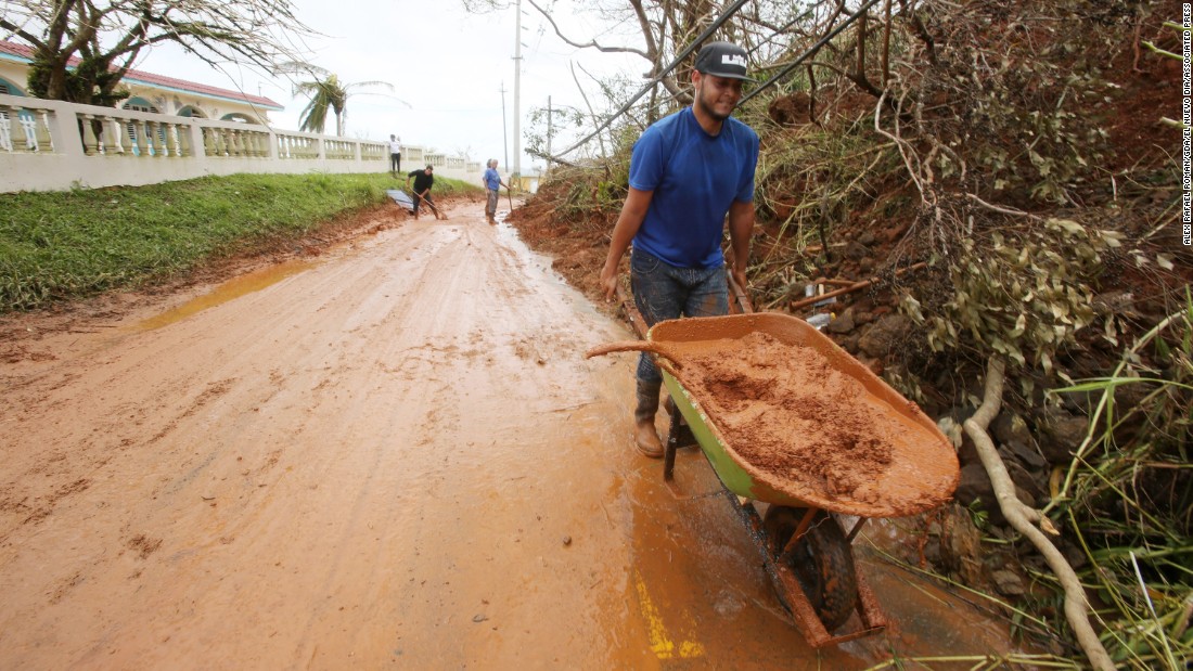 Residents in Quebradillas are trying to begin cleanup on their own. 