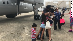 Families leave working loved ones behind to help Puerto Rico