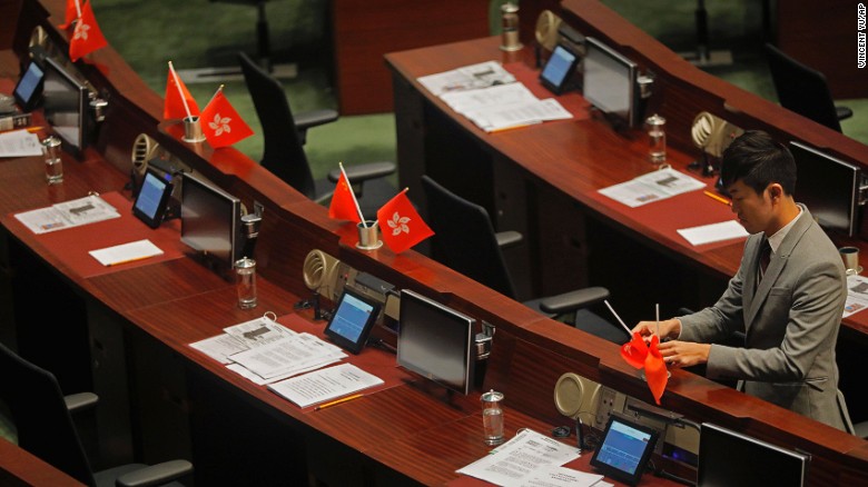 Lawmaker Cheng Chung-tai was found guilty of &quot;desecrating&quot; Hong Kong&#39;s flag by flipping it over during a parliamentary session. 