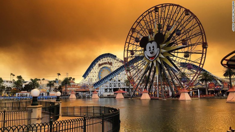 Fires are evident Monday in this Junior Olivas photo at Disneyland California Adventure Park in Anaheim.