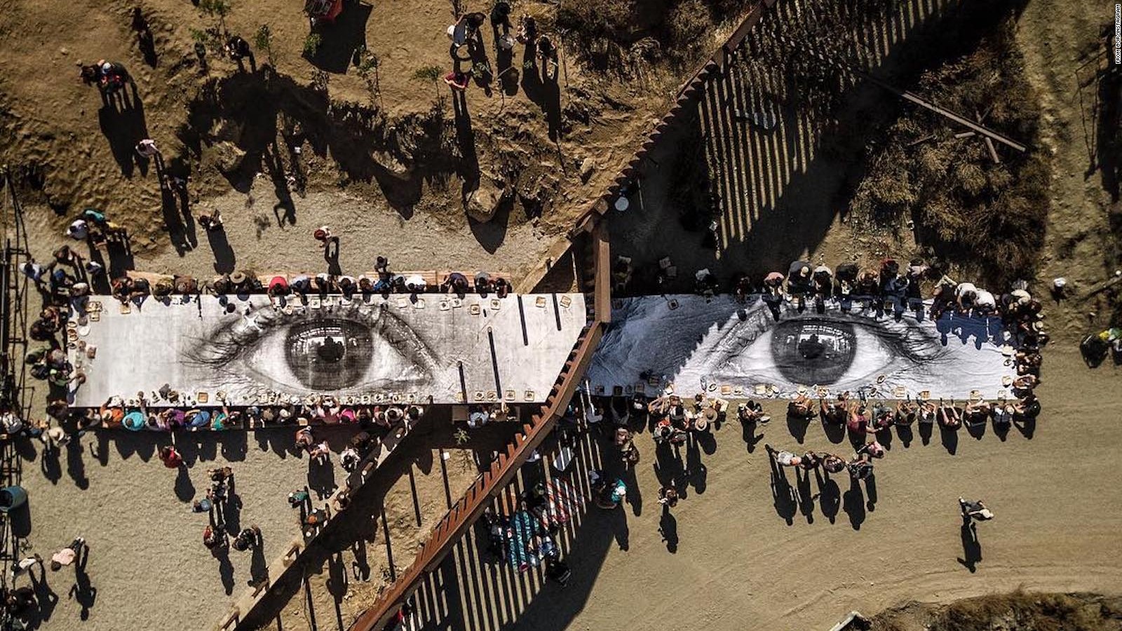 Instagram user @JR posted this ariel view of the "Giant Picnic" at the border.