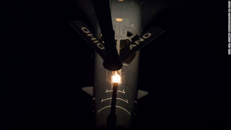 A US Air Force B-1B bomber is refueled midflight during a nighttime mission off the Korean Peninsula on October 10.
