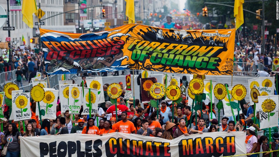 People gather near Columbus Circle before the People&#39;s Climate March in New York on Sunday, September 21. People from around the world are participating in what&#39;s billed as the largest march ever calling for action on global warming.