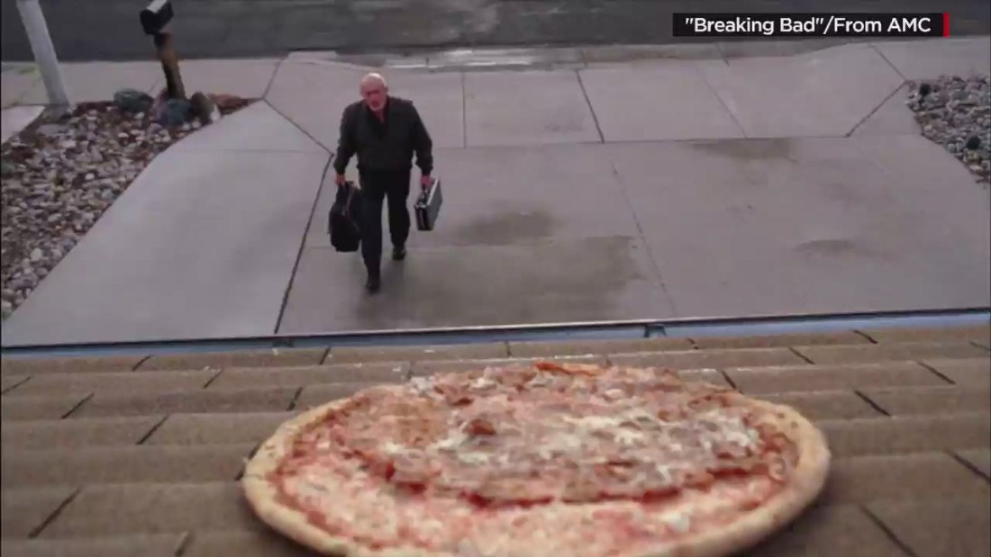 Why is a home in Albuquerque being pelted with pizza? CNN Video