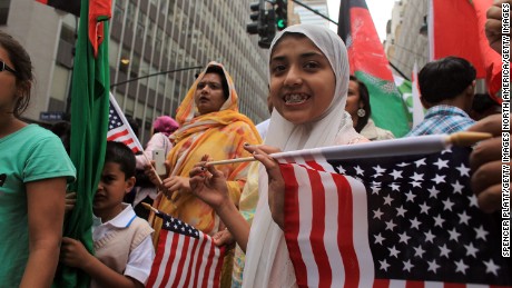 NEW YORK - SEPTEMBER 26:  Participants wait for the  start of the American Muslim Day Parade on September 26, 2010 in New York, New York. The annual parade celebrates the presence and contributions of Muslims in New York City and surrounding areas. The parade, which attracts hundreds of participants, concludes with a bazaar selling food, clothing, and books from various Muslim nations.  (Photo by Spencer Platt/Getty Images)