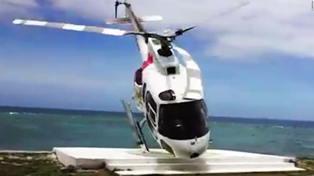 Helicopter comes flying at tourists - CNN Video