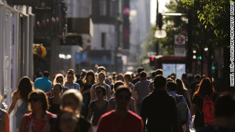 Pedestrians walk along the pavement in the busy shopping district on Oxford Street central London on August 17, 2016.  
Retail sales in Britain, a key driver of the country&#39;s economy, rebounded 1.4 percent in July from the previous month&#39;s drop, official data showed on August 18, calming fears over any immediate fallout from Brexit. Sales by volume rose sharply following a 0.9-percent drop in June that had been caused by wet summer weather, according to the Office for National Statistics.
 / AFP / DANIEL LEAL-OLIVAS        (Photo credit should read DANIEL LEAL-OLIVAS/AFP/Getty Images)