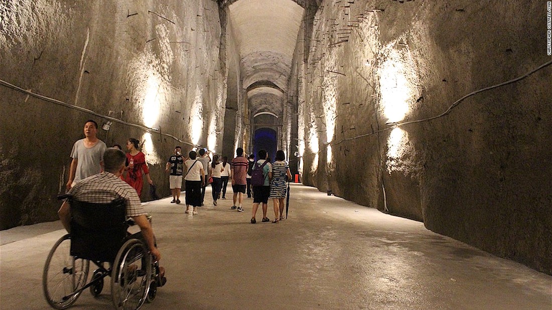 Final halls in the plant resemble gigantic mine tunnels with 200-foot ceilings cut out of rock and lit with white lights. 