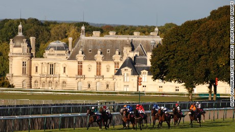 CHANTILLY, FRANCE - OCTOBER 02: Harry Bentley riding Limato (L, green) win The Qatar Prix de La Foret at Chantilly racecourse on October 02, 2016 in Chantilly, France. (Photo by Alan Crowhurst/Getty Images)