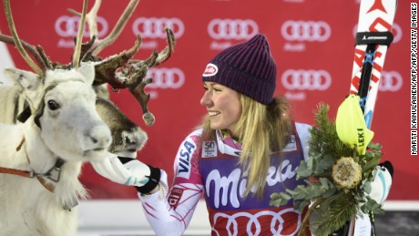 CORRECTION - Mikaela Shiffrin of the US poses with a white reindeer named &quot;Mikaela&quot; she was given after winning the Ladies&#39; FIS Alpine Skiing World Cup slalom race in Levi Kittilä, Finland on November 12, 2016. / AFP / Lehtikuva / Martti Kainulainen / Finland OUT / The erroneous mention appearing in the metadata of this photo by Martti Kainulainen has been modified in AFP systems in the following manner: [Mikaela Shiffrin of the US poses with a white reindeer named &quot;Mikaela&quot; she was given after winning the Ladies&#39; FIS Alpine Skiing World Cup slalom race in Levi Kittilä, Finland on November 12, 2016. ] instead of [Mikaela Shiffrin of the US jokes with Santa Claus reindeer after winning the Ladies&#39; FIS Alpine Skiing World Cup slalom race in Levi Kittilä, Finland on November 12, 2016.]. Please immediately remove the erroneous mention from all your online services and delete it  from your servers. If you have been authorized by AFP to distribute it  to third parties, please ensure that the same actions are carried out by them. Failure to promptly comply with these instructions will entail liability on your part for any continued or post notification usage. Therefore we thank you very much for all your attention and prompt action. We are sorry for the inconvenience this notification may cause and remain at your disposal for any further information you may require.        (Photo credit should read MARTTI KAINULAINEN/AFP/Getty Images)