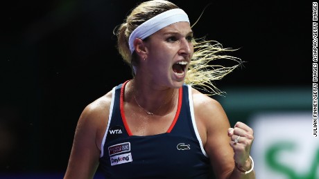 SINGAPORE - OCTOBER 23:  Dominika Cibulkova of Slovakia celebrates a point in her singles match against Angelique Kerber of Germany during day 1 of the BNP Paribas WTA Finals Singapore at Singapore Sports Hub on October 23, 2016 in Singapore.  (Photo by Julian Finney/Getty Images)