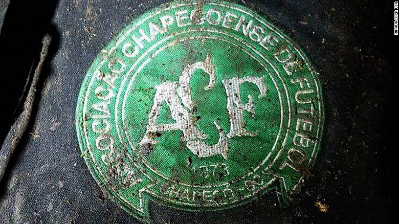 A logo of Brazilian soccer team Chapecoense is found at the site of the plane crash.