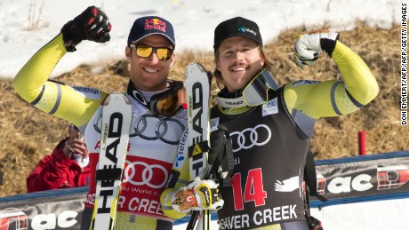 Patches of snow on the dry hill are seen behind Norwegians Aksel Lund Svindal (L), second, and Kjetil Jansrud, third, as they celebrate after the FIS Alpine World Cup Men&#39;s Downhill on November 30, 2012 in Beaver Creek, Colorado.     AFP PHOTO / DON EMMERT        (Photo credit should read DON EMMERT/AFP/Getty Images)