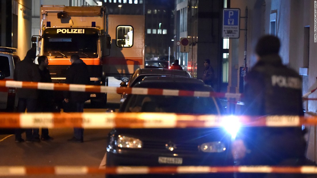 Swiss police are seen behind police cordon outside a Muslim prayer hall, central Zurich, on December 19, 2016, after three people were injured by gunfire.
Local media reported the incident occurred in the Muslim prayer hall near the city&#39;s railway station. Swiss media said the three wounded people, all adults, were found in the street where the prayer hall is located. The suspected assailant had fled the scene and police sealed off the area.


 / AFP / MICHAEL BUHOLZER        (Photo credit should read MICHAEL BUHOLZER/AFP/Getty Images)