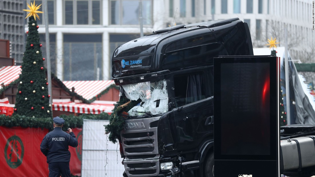 BERLIN, GERMANY - DECEMBER 20:  Rescue workers begin to remove the cab of the lorry the morning after it ploughed through a Christmas market on December 20, 2016 in Berlin, Germany. Several people have died while dozens have been injured as police investigate the attack at a market outside the Kaiser Wilhelm Memorial Church on the Kurfuerstendamm and whether it is linked to a terrorist plot.  (Photo by Sean Gallup/Getty Images)