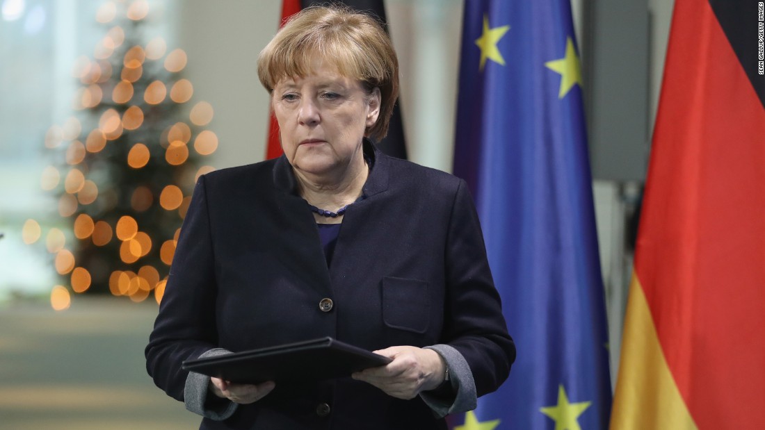 BERLIN, GERMANY - DECEMBER 20:  German Chancellor Angela Merkel arrives to give a statement the day after a man drove a truck into a crowded Christmas market on December 20, 2016 in Berlin, Germany. The man, whom police apprehended and have identified as a Pakistani national, drove the heavy truck into the Christmas market in the city center, killing 12 people and injuring 48.  (Photo by Sean Gallup/Getty Images)