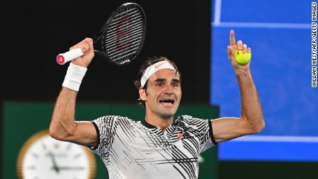 Switzerland&#39;s Roger Federer celebrates his victory against Spain&#39;s Rafael Nadal during the men&#39;s singles final on day 14 of the Australian Open tennis tournament in Melbourne on January 29, 2017. 