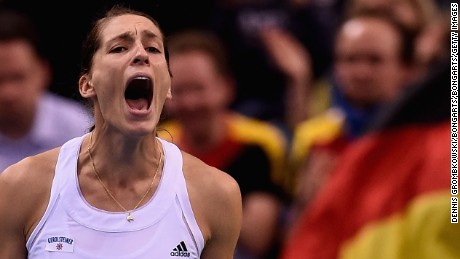 STUTTGART, GERMANY - FEBRUARY 07:  Andrea Petkovic of Germany celebrates after her victory in her single match against Samantha Stosur of Australia during the Fed Cup 2015 World Group First Round tennis between Germany and Australia at Porsche-Arena on February 7, 2015 in Stuttgart, Germany.  (Photo by Dennis Grombkowski/Bongarts/Getty Images)