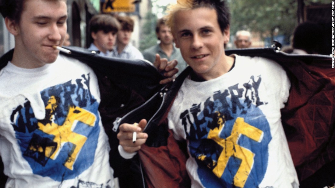 Two boys wearing Vivienne Westwood Destroy T-shirts. 