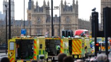Ambulances wait as members of the emergency services work on Westminster Bridge, alongside the Houses of Parliament in central London on March 22, 2017, during an emergency incident.
British police shot a suspected attacker outside the Houses of Parliament in London on Wednesday after an officer was stabbed in what police said was a "terrorist" incident. One woman has died and others have "catastrophic" injuries following a suspected terror attack outside the British parliament, local media reported on Wednesday citing a junior doctor. / AFP PHOTO / NIKLAS HALLE'N        (Photo credit should read NIKLAS HALLE'N/AFP/Getty Images)