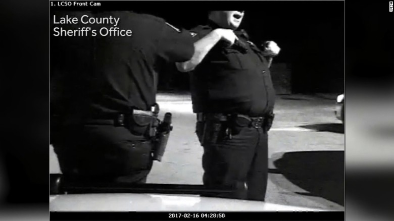 Dashcam video caught this image of Deputy Dean Zipes, right.