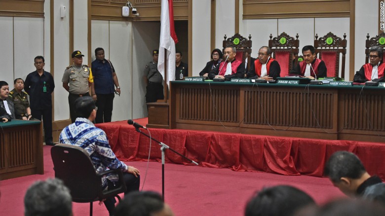 Ahok sits on the defendant&#39;s chair as he attends his sentencing hearing in Jakarta on May 9.