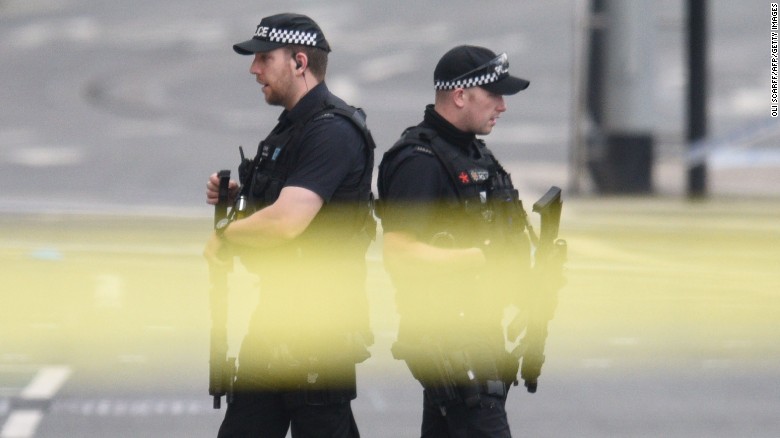 Armed police patrol near Manchester Arena following a deadly terror attack in Manchester, northwest England on May 23, 2017.
Twenty two people have been killed and dozens injured in Britain's deadliest terror attack in over a decade after a suspected suicide bomber targeted fans leaving a concert of US singer Ariana Grande in Manchester. / AFP PHOTO / Oli SCARFF        (Photo credit should read OLI SCARFF/AFP/Getty Images)