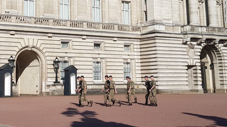 Soldiers march through the grounds of Buckingham Palace in London, two days after an apparent terrorist attack on an Ariana Grande concert in Manchester. 