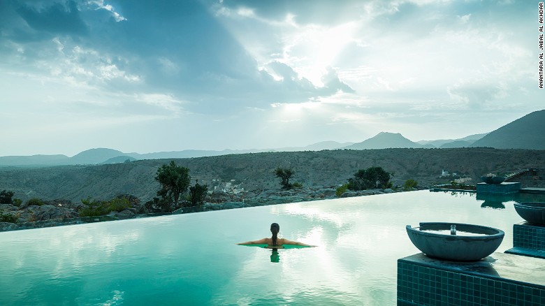 The Anantara Al Jabal Akhdar Resort features an infinity pool overlooking Oman&#39;s grand canyon.