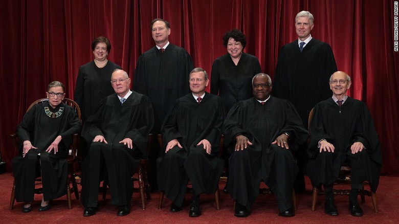 The justices of the Supreme Court gather for an official group portrait to include new Associate Justice Neil Gorsuch, top row, far right, on June 1, 2017 at the Supreme Court Building in Washington. Seated, from left are Associate Justice Ruth Bader Ginsburg, Associate Justice Anthony Kennedy, Chief Justice John Roberts, Associate Justice Clarence Thomas, and Associate Justice Stephen Breyer. Standing, from left: Associate Justice Elena Kagan, Associate Justice Samuel Alito Jr., Associate Justice Sonia Sotomayor and Gorsuch. 